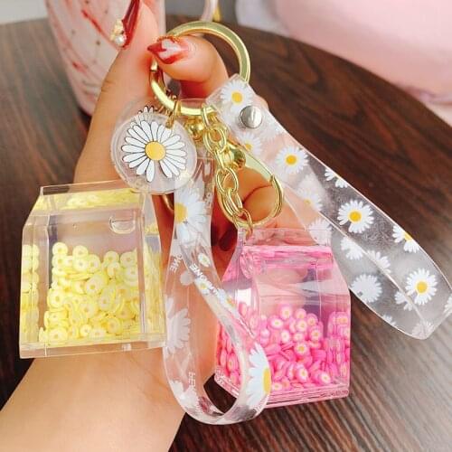 2021 Creative Cute Daisy Fruit Milk Bottle Keychain Floating Moving Liquid Quicksand Drift Bottle Keyring For Women Bag Pendant