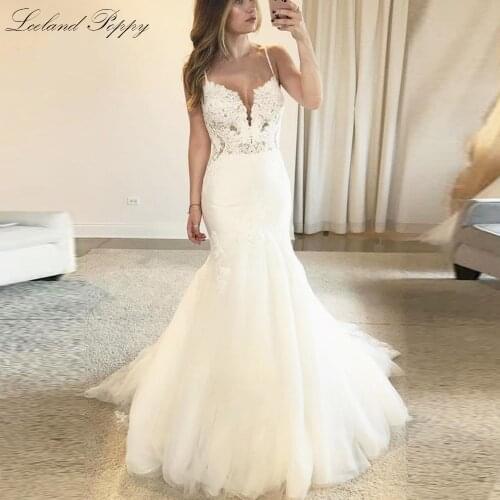 Lceland Poppy Sexy Mermaid Wedding Dresses 2020 Spaghetti Straps Floor Length V-neck Backless Lace Appliques Bridal Gowns