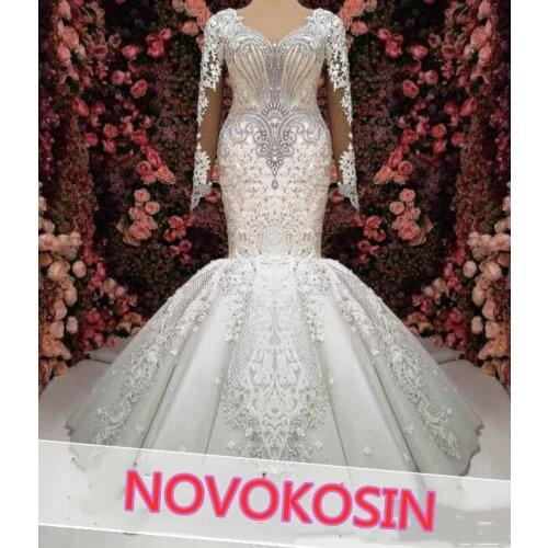2020 Real Sample Beading African Sequin Lace Wedding Dresses Crystals Luxury Long Sleeves Mermaid Bridal Gowns