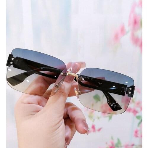 Womens Sunglasses Trending Rectangle Frameless Glasses Fashion American Style Personality Hollow Out Temple Men Glasses UV400