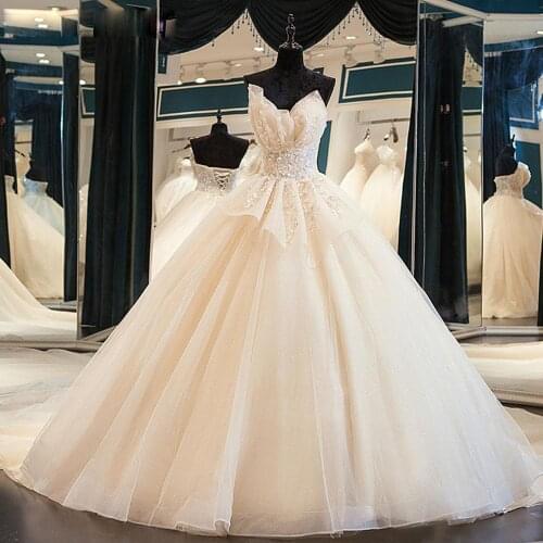 Robe De Mariee Shinny Tulle Sweetheart Ball Gown Bridal Sleeveless Princess Gorgeous Beaded Lace Appliques Wedding Dresses 2021