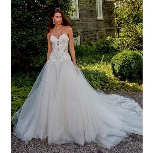 Wedding Dress A-Line Sweetheart Sleeveless Lace Appliques Sequined Backless Tulle Floor Length Sweep Train Bride Gown New