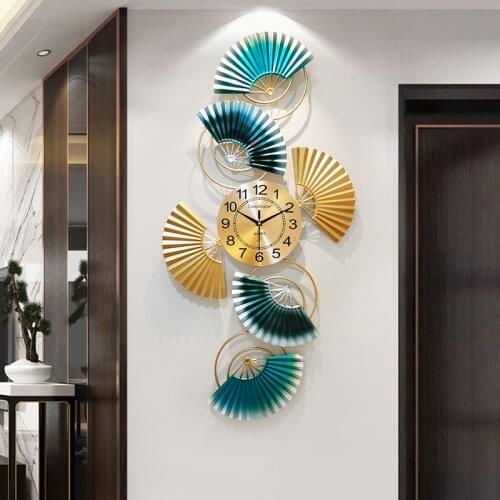 Fan restaurant decorated with watches and clocks creative light luxury wall decoration modern silent clock wall large wall clock