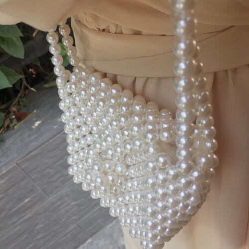 The New Cute Girls Hand Pearl Worn Thin Shoulder Phone Zero Wallet RestoringAncient Ways