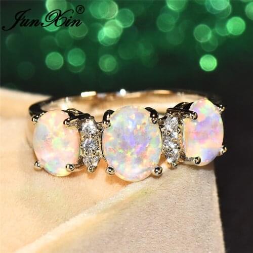 JUNXIN Vintage Female Oval White Fire Opal Ring Silver Color Rainbow Birthstone Wedding Enggaement Ring Jewelry CZ