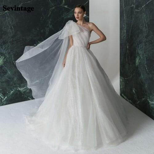 Sevintage Glitter Tulle Wedding Dresses One Shoulder with Big Bow Shiny Bridal Gowns A-Line Backless Sleeveless Bride Dress 2021