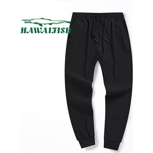 Summer ice silk nine-point pants mens thin Korean version of loose wild sports pants tie-leg casual pants men 6XL