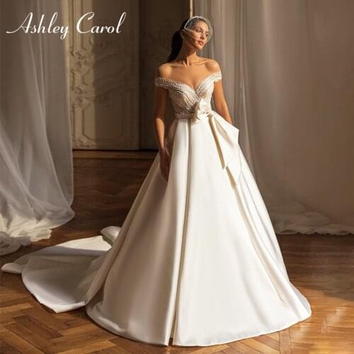 Ashley Carol A-Line Wedding Dress 2021 Delicate Beaded Embroidery Sweetheart Satin Bride Bow Backless Princess Bridal Gowns