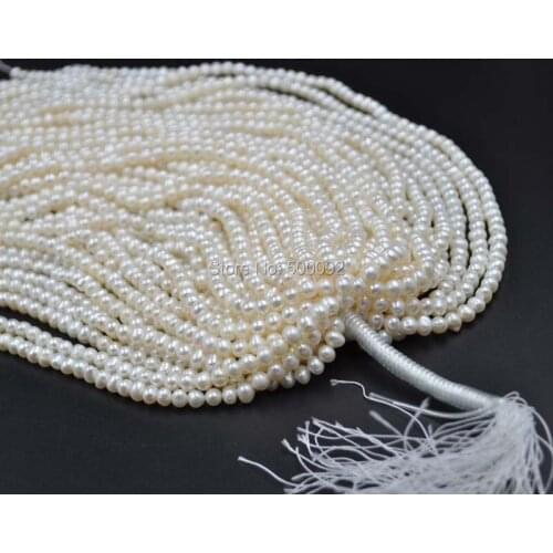 Wholesale 50 strands 5-6mm white freshwater pearl strands