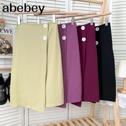 Temperament solid Skirt high waist single row two buttons irregular design mid-length A-line Skirt 2021 New Summer