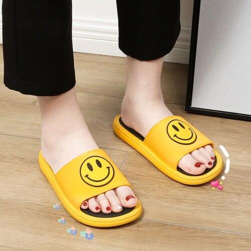 Sandals and slippers for women wear 2021 new fashion trends in summer. Couples live in a pair of bath slippers for men