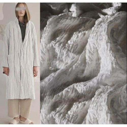 White cotton and linen embroidery folds elastic irregular three-dimensional texture creative clothing fabric