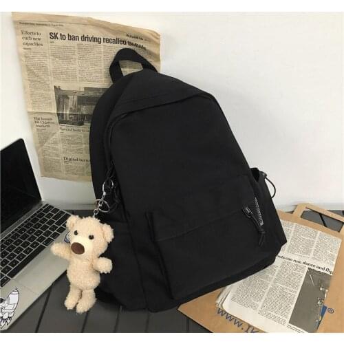 Backpack female fashion trend junior high school students high school students canvas bag male simple Korean leisure