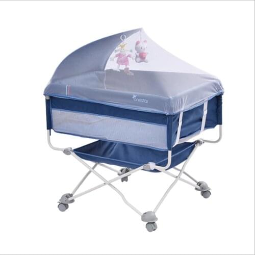 Multifunctional crib with roller mosquito nets newborn splicing bed suitable for travel portable cribs between 0-2 years old