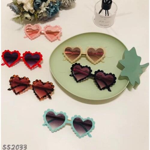The new heart wavy edge plastic glasses 2033 baby childrens personality uv400 sunglasses shading mirror manufacturer