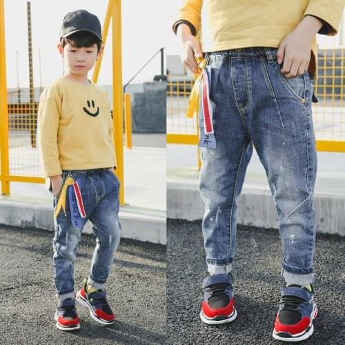 Boys jeans spring and autumn new Korean style in the trend of big childrens baby feet pants Western style childrens pants trou