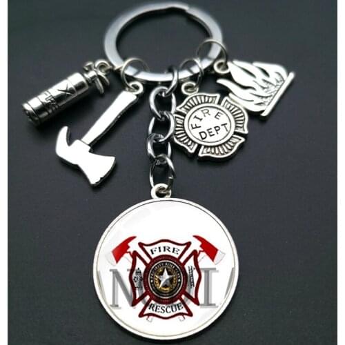 Cartoon fireman alloy key chain with the same style for men and women