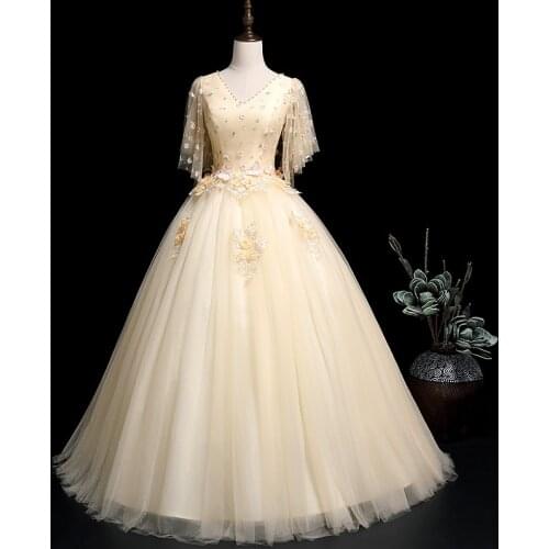 Elegant Champagne Quinceanera Dresses Fashion V-neck Half Sleeve Embroidery Applique Party Ball Gown Floor Length Prom Dress