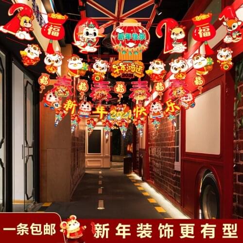 Year of the Ox ornaments New Year goods shop scene layout creative pull flag