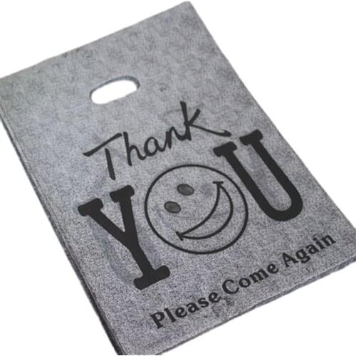 Hot Sale Wholesale 100pcs/lot 25*35cm Gray Thank You Smile Face Large Shopping Packaging Bags With Handle Plastic Gift Bags