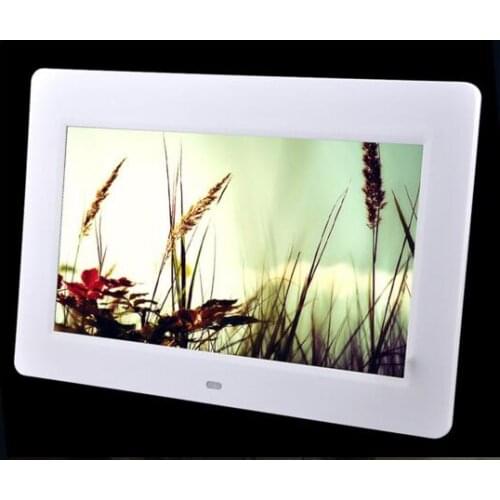 Brand new 10.1" HD Digital Photo Frame 1024x600 Picture Mult-Media Player MP3 MP4 Alarm Clock For family or office showing