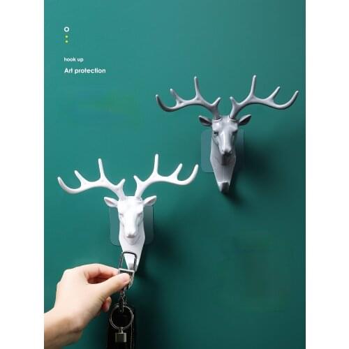 Creative cute antler hook Nordic wall hanging punch-free entry door strong viscose hanging key holder on the back wall