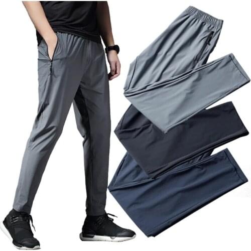 Men Running Jogging Pants Pockets Gym Sports Athletic Football Soccer Training Sports Pants Elastic Outdoor Workout Trousers