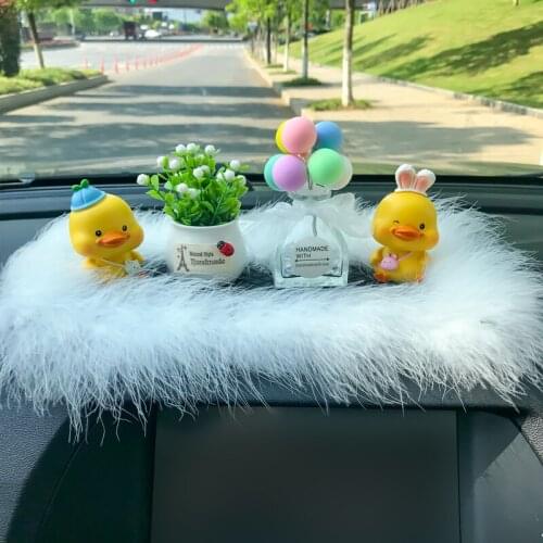 New High-End Cartoon Shaking Head Little Yellow Duck Female Car Gift Car Interior Decoration Ornament
