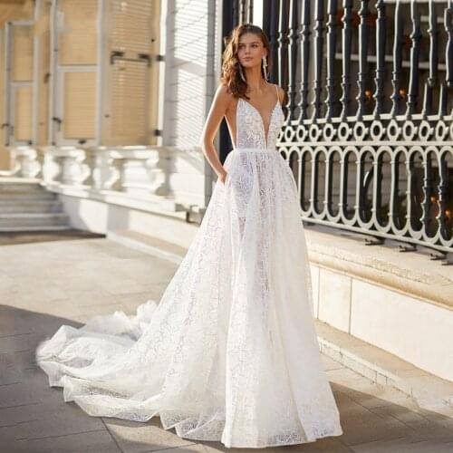 Sexy A-Line Wedding Dress 2021 Spaghetti Straps Beaded Lace Appliques V-Neck Bride Backless Beach Bridal Gowns Robe De Mariee