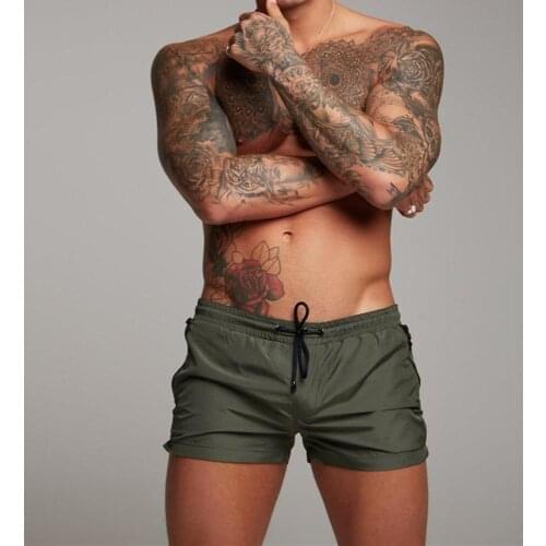 2021 Summer Swimwear Men Swim Trunks Solid Beach Swimming Pants Quick Dry Sexy Swimming Shorts Swimsuit Breathable Swim Briefs