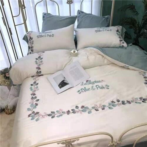 High end light luxury 60s double sided Austrian Lanjing Tencel four piece set silky and soft embroidered quilt cover bedding