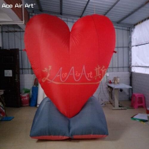 Free standing heart with base inflatable heart replica with interior blower same as photo booth can add lights inside