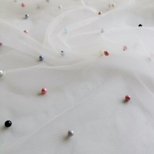 Irregular pearls mesh fabric Off white lace dress perspective fabric inlaid with pearl creative designer wedding fabric