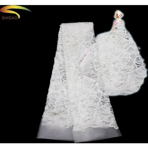Shidao high quality sequined white flower design lace materials