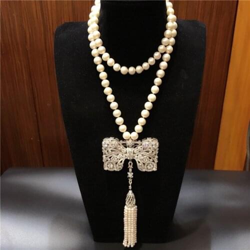 Hot sell new style 9-10mm white freshwater pearl necklace bowknot zircon accessories long tassel sweater chain fashion jewelry