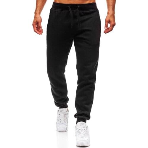 New Mens Fitness Sports Pants Mens Solid Color Drawstring Pockets Large Size Casual Pants European and American Sports Pants