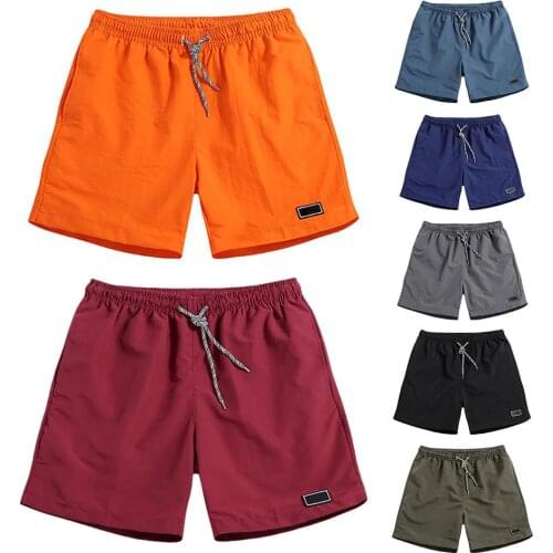 Men Casual Breathable Quick Dry Pants Pockets Beach Solid Color Sport Shorts