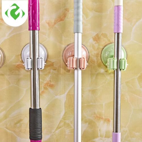 Multifunctional powerful seamless nailless door rear mop hook bathroom vacuum cup broom storage rack kitchen wall hanging