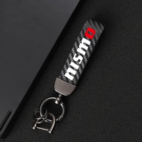 Carbon fiber leather keychain 360 Degree Rotating Horseshoe Key Rings For Nissan Nismo Tiida Teana Skyline X-Trail Qashqai car