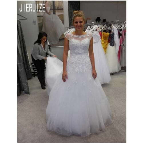 IERUIZE White Wedding Dresses Scoop Neck Sheer Cap Sleeve Lace Appliques Button Back Tulle A Line Bridal Gowns vestido de noiva