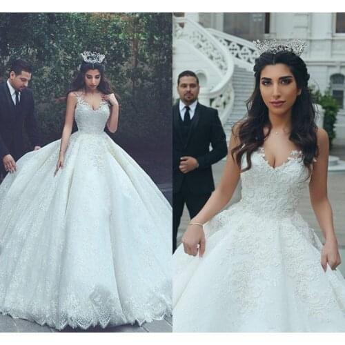 Modest Middle East Arabic Dubai Lace Wedding Dresses Ball Gowns Spaghetti Straps Sexy Backless Long Bridal Church Formal
