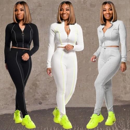48SM9132European and American womens fashion and leisure solid color zipper slim fit coat pants sports two piece set