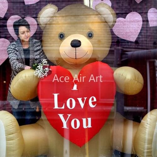 Lovely brown sitting inflatable bear with inflatable love heart shape replica model in hand for event/Valentines Day decoration