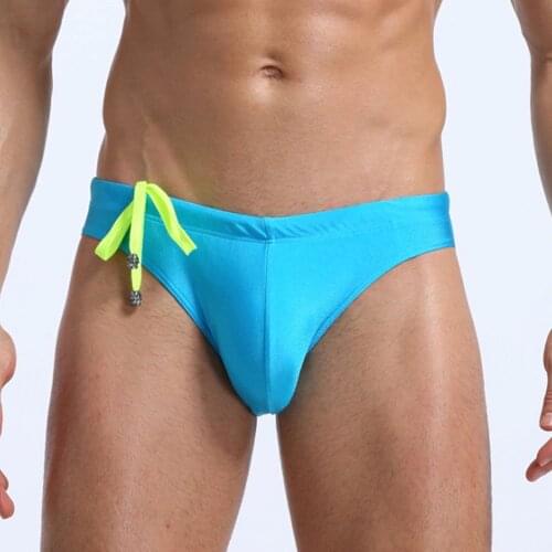 European And American Mens Swimming Trunks Quick Drying Beach Swimsuit Mens Sports Swimming Trunks Mens Solid Color Swimsuit