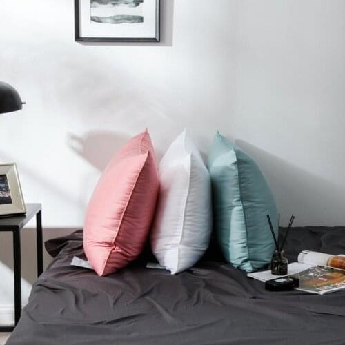 Washed Soft and Skin-Friendly Fabric Sleep Pillows in Homes and Beauty Places to Care for the Skin and Bring Good Sleep
