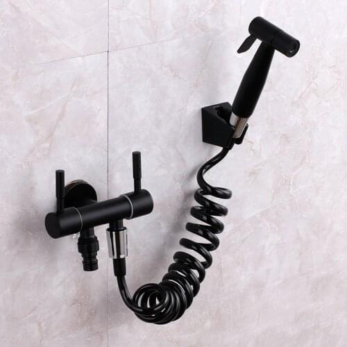 Wall mounted two connect holes bidet sprayer faucet has spray water gun