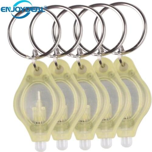 10pcs/lot Mini Keychain Squeeze Light Lamp Micro LED Flashlight Keychain Torch Outdoor Camping Emergency Key Ring Light plastic