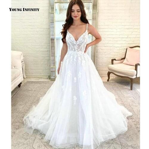 New Arrival A Line Wedding Dresses 2021 Sleeveless Bridal Gown Illusion Back V Neck Court Train Applique White Plus Size Bride
