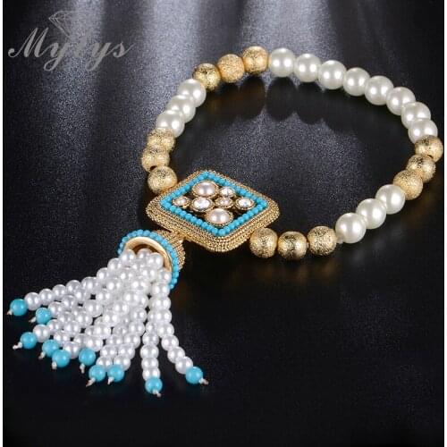 Mytys Fashion Handmade Pearls Bracelet Elastic Free Size Beaded Bracelet for Women Romantic Design B951