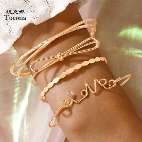 Tocona 4pcs/sets New Trendy Love Gold Braceles for Women Lovely Bow-knot Opening Bangle Alloy Metal Party Jewelry Gift 19681